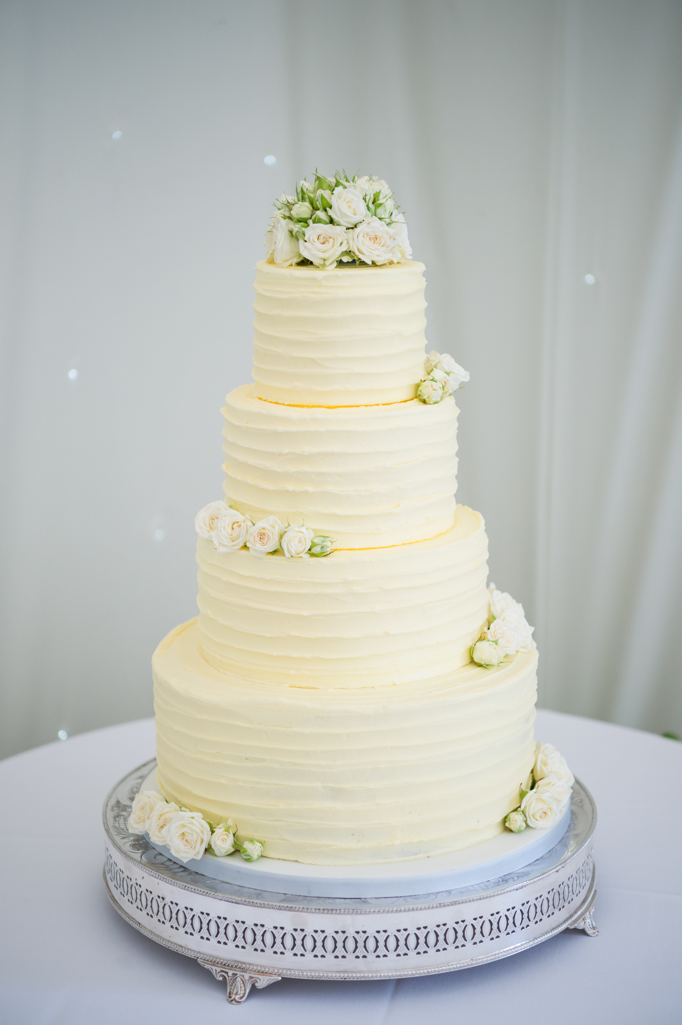 4 tier wedding cake made by Julie painter